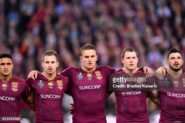 Valentine Holmes, Michael Morgan, Coen Hess, Tim Glasby and Matt Gillett of the Maroons embrace before game three of the State Of Origin series...