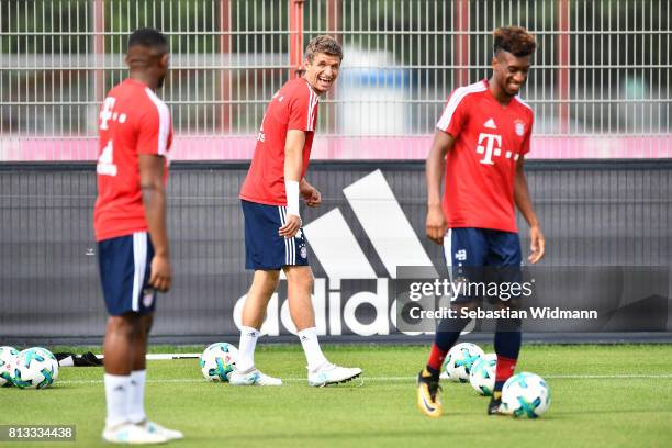 Thomas Mueller of FC Bayern Muenchen laughs during a training session at Saebener Strasse training ground on July 12, 2017 in Munich, Germany.