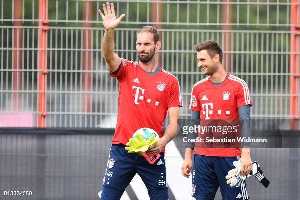 Goalkeeper Tom Starke waves during a training session at Saebener Strasse training ground on July 12, 2017 in Munich, Germany.