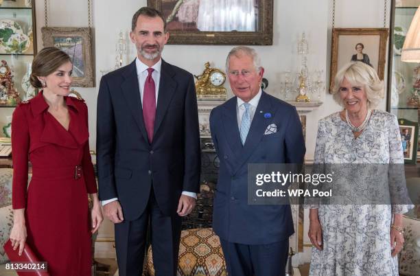 Britain's Prince Charles, Prince of Wales and Camilla, Duchess of Cornwall greet King Felipe VI of Spain and Queen Letizia of Spain as they visit...