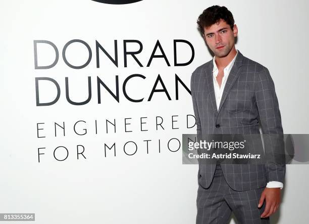 Model Sean O'Pry attends the EFM Engineered For Motion Spring/Summer 2018 Runway Show at Skylight Clarkson Square on July 12, 2017 in New York City.
