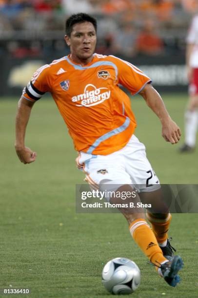 Brian Ching of the Houston Dynamo controls the ball against the New York Red Bulls on May 31, 2008 at Robertson Stadium in Houston, Texas.