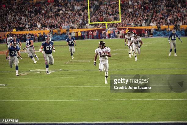 Football: Super Bowl XXXV, Baltimore Ravens Duane Starks in action, scoring TD after making interception vs New York Giants, Tampa, FL 1/28/2001