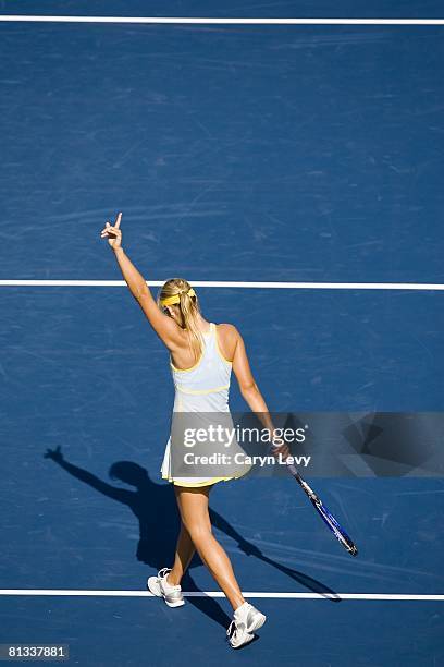 Tennis: US Open, Aerial rear view of RUS Maria Sharapova victorious during 3rd round vs Germany Julia Schruff at National Tennis Center, Flushing, NY...