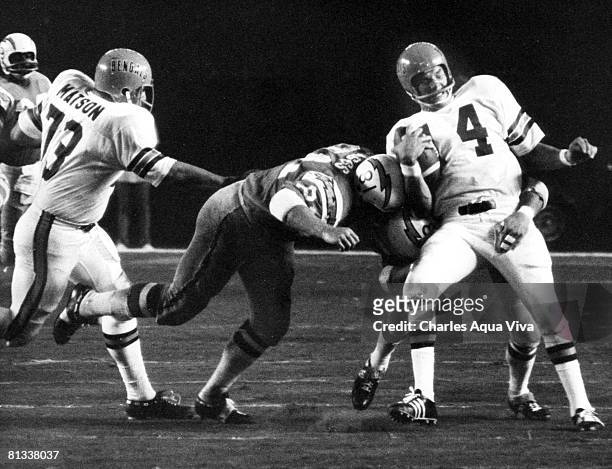 San Diego Chargers linebacker Jeff Staggs gets past Cincinnati Bengals guard Pat Matson to sack quarterback Sam Wyche during a 21-14 Chargers victory...