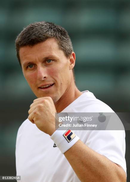 Ken Skupski of Great Britain reacts during the Mixed Doubles third round match against Ekaterina Makarova of Russia and Max Mirnyi of Belarus on day...