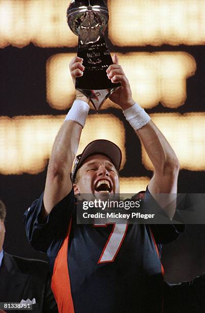 Football: Super Bowl XXXII, Closeup of Denver Broncos QB John Elway victorious with trophy after winning game vs Green Bay Packers, San Diego, CA...