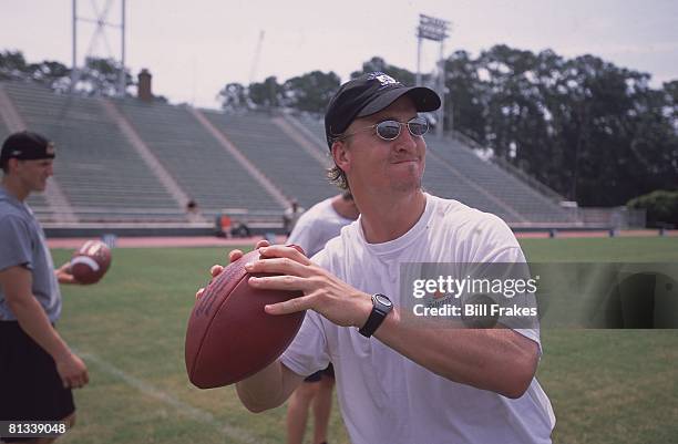 Football: Manning Passing Academy, Closeup of Indianapolis Colts QB Peyton Manning in action during practice drill for high school quarterbacks at...