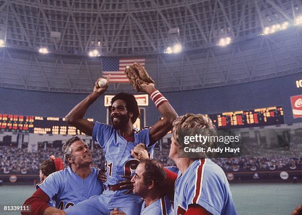 Baseball: NLCS Playoffs, Philadelphia Phillies Garry Maddox victorious, getting carried off field by manager Dallas Green and team after winning Game...