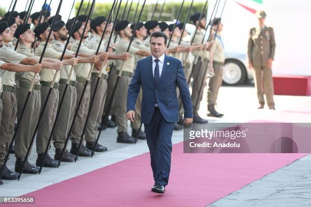 Prime Minister of Macedonia Zoran Zaev walks past the honour guard as he arrives at the Western Balkans summit in Piazza Unita d'Italia in Trieste,...