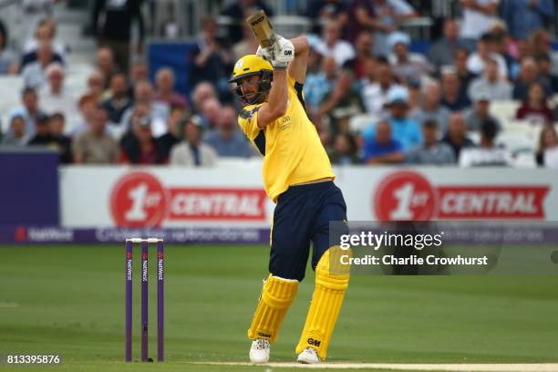 James Vince of Hampshire hits out during the NatWest T20 Blast match between Sussex Sharks and Hampshire at The 1st Central County Ground on July 12,...