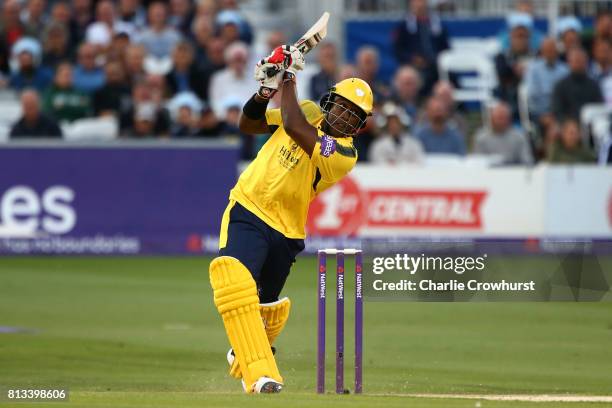 Michael Carberry of Hampshire hits out during the NatWest T20 Blast match between Sussex Sharks and Hampshire at The 1st Central County Ground on...