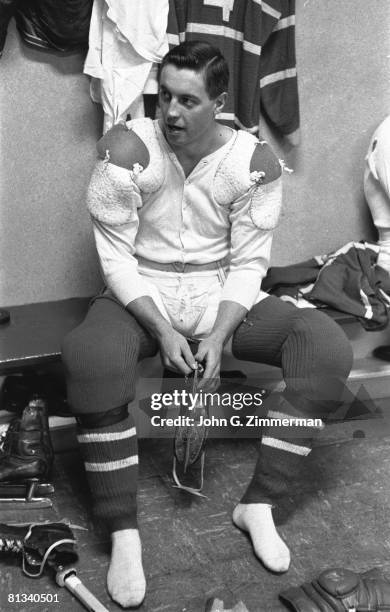 Hockey: Montreal Canadiens Jean Beliveau in locker room before game vs Chicago Blackhawks, Montreal, CAN 1/25/1958