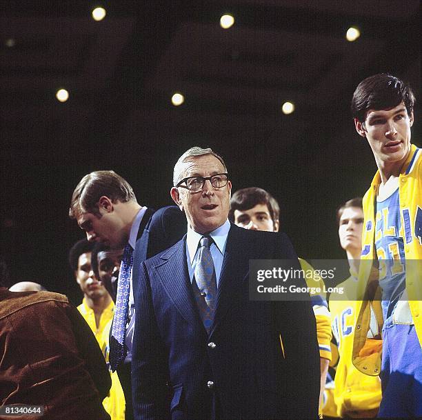 College Basketball: Closeup of UCLA coach John Wooden on sidelines team during game vs Washington State, Pullman, WA 2/21/1972