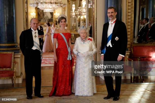 Britain's Queen Elizabeth II, her husband Prince Philip, Duke of Edinburgh, King Felipe VI of Spain and Queen Letizia of Spain pose for a group...