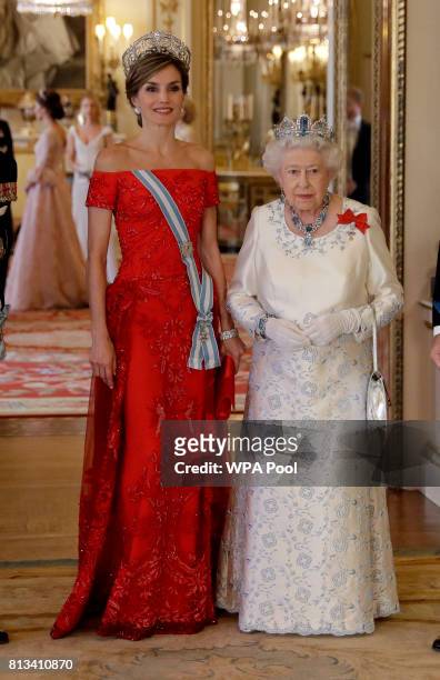 Britain's Queen Elizabeth II and Queen Letizia of Spain pose for a group photograph before a State Banquet at Buckingham Palace on July 12, 2017 in...