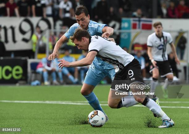 Louth , Ireland - 12 July 2017; David McMillan of Dundalk in action against Johan Laerdre Djordai of Rosenborg during the UEFA Champions League...