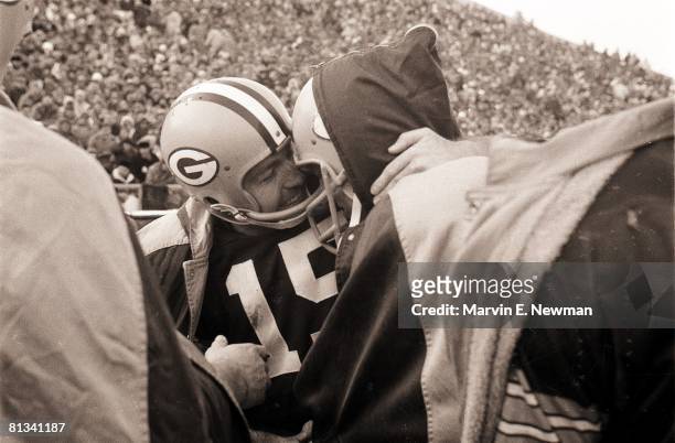Football: championship, Closeup of Green Bay Packers QB Bart Starr victorious with Jerry Kramer during game vs New York Giants, Green Bay, WI