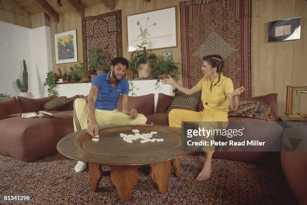 Basketball: Casual portrait of Los Angeles Lakers Kareem Abdul-Jabbar with girlfriend Cheryl Pistono at his home in Bel-Air, Los Angeles, CA 3/8/1980