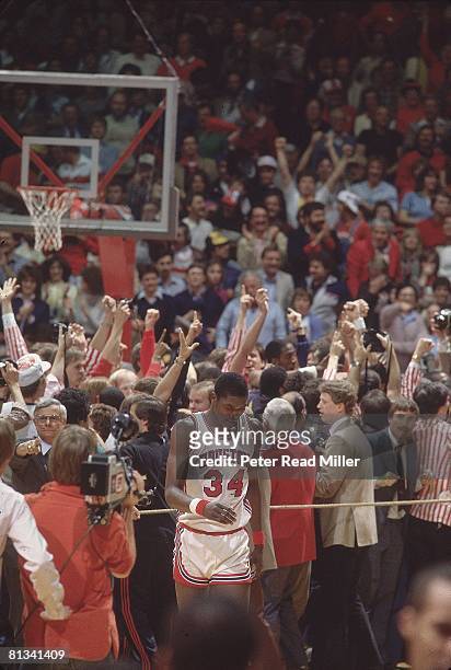 College Basketball: NCAA Final Four, Houston Akeem Olajuwon upset after losing championship game vs North Carolina State, Albuquerque, NM 4/4/1983