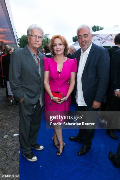 Juergen Prochnow his wife Verena Prochnow-Wengler and Hans-Rainer Schroeder of BMW attend the summer party 2017 of the German Producers Alliance on...