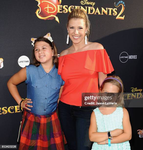 Actress Jodie Sweetin and daughters Zoie Laurel May Herpin and Beatrix Carlin Sweetin Coyle attend the premiere of "Descendants 2" at The Cinerama...