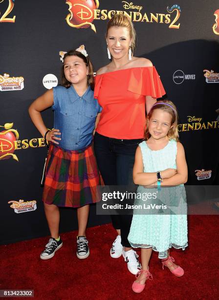 Actress Jodie Sweetin and daughters Zoie Laurel May Herpin and Beatrix Carlin Sweetin Coyle attend the premiere of "Descendants 2" at The Cinerama...