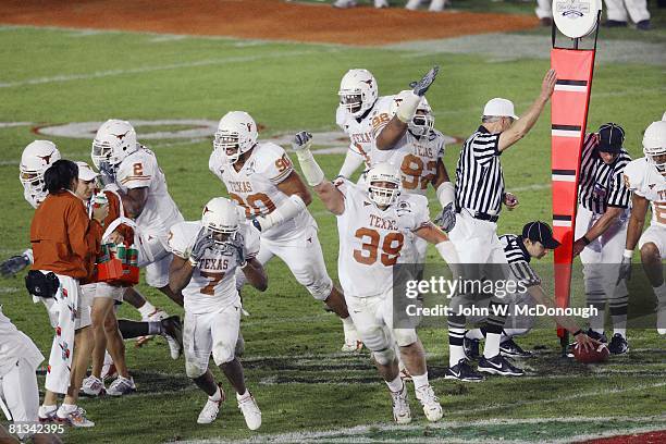 College Football: Rose Bowl, Texas defense victorious after stopping USC first down during 4th quarter, setting them up for BCS Championship win,...