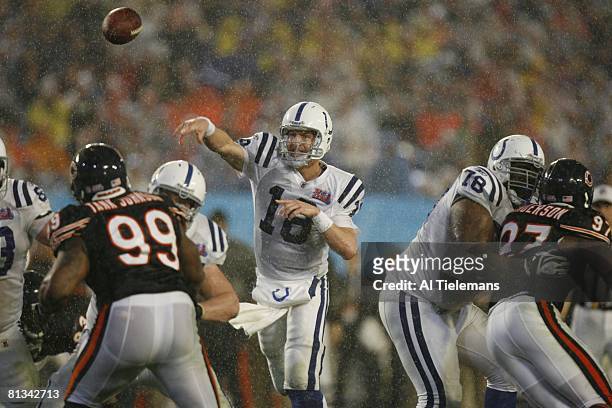 Football: Super Bowl XLI, Indianapolis Colts QB Peyton Manning in action, making pass vs Chicago Bears, Rain, weather, Miami, FL 2/4/2007