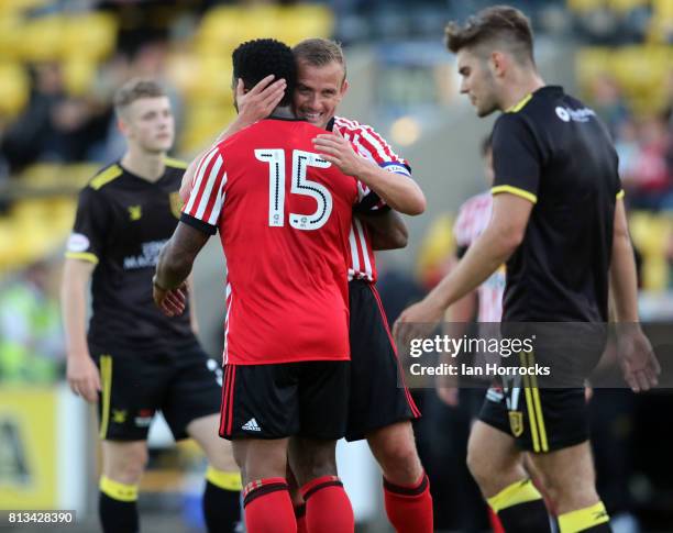 Jeremain Lens of Sunderland celebrates with Lee Cattermole as he scores the third goal during a pre-season friendly match between Livingston FC and...