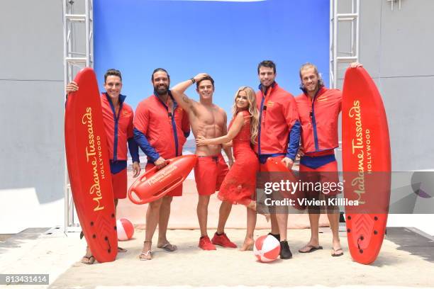 Madame Tussauds Hollywood unveils new Zac Efron "Baywatch" wax figure with Carmen Electra and the men of Australia's Thunder from Down Under at...