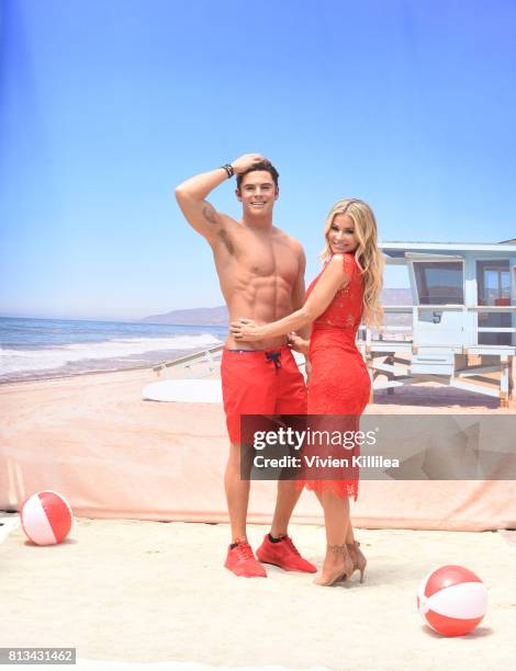 Madame Tussauds Hollywood unveils new Zac Efron "Baywatch" wax figure with Carmen Electra and the men of Australia's Thunder from Down Under at...