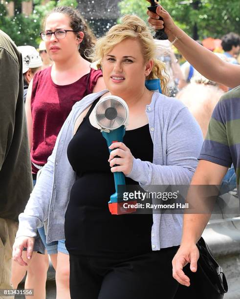 Actors Rebel Wilson film a scene at the 'Isn't It Romantic' movie set in Washington Square Park on July 12, 2017 in New York City.
