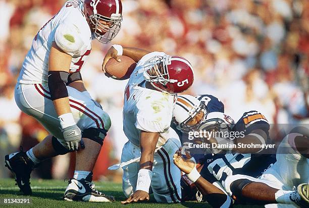 College Football: Alabama QB Andrew Zow in action during tackle vs Auburn Jarret Johnson and Terry Jones, Jr, , Auburn, AL