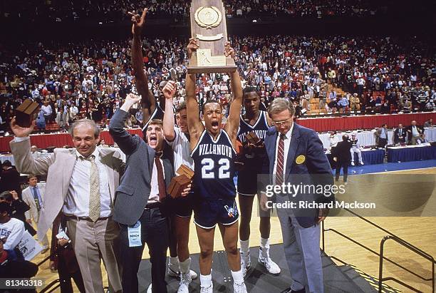 College Basketball: NCAA Final Four, Villanova Gary McLain victorious with trophy after winning game vs Georgetown, Lexington, KY 4/1/1985