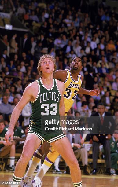 Basketball: Boston Celtics Larry Bird in action, boxing out vs Los Angeles Lakers Magic Johnson , Los Angeles, CA 2/24/1984