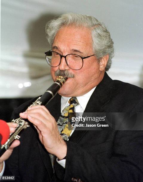 Actor Hal linden shows off his musical talent by playing at the ''Friends and Fame Ball'' Sponsored by the Bronx Tourism Council and held Saturday,...