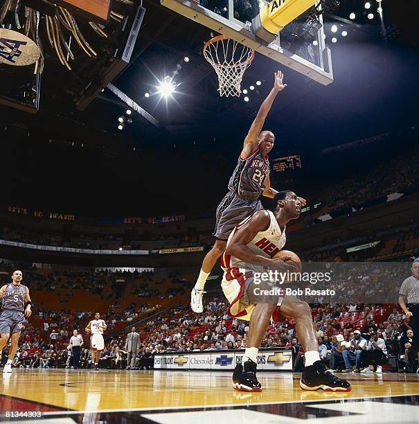 Basketball: New Jersey Nets Richard Jefferson in action vs Miami Heat's Eddie Jones , Miami, FL
