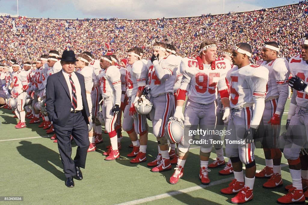Ohio State coach Earle Bruce with team before game vs Michigan,... News ...