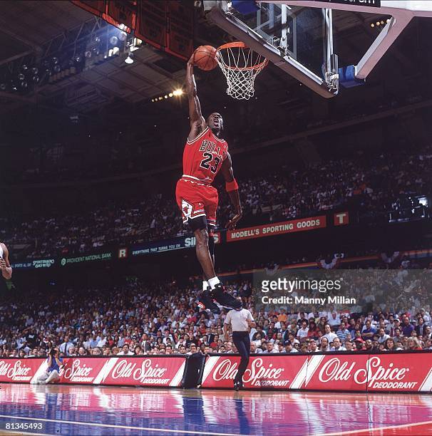 Basketball: NBA Playoffs, Chicago Bulls Michael Jordan in action, making dunk vs Philadelphia 76ers, Game 3, Philadelphia, PA 5/10/1991