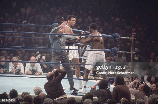 Boxing: NABF Heavyweight Title, Muhammad Ali in action vs Joe Frazier at Madison Square Garden, View of referee Tony Perez, New York, NY 1/28/1974