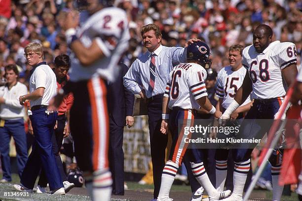 Football: Chicago Bears coach Mike Ditka on sidelines with kicker Bob Thomas during game vs Green Bay Packers, Green Bay, WI 9/16/1984