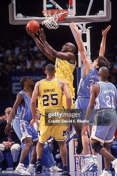 Final Four, Michigan Chris Webber with referee Gerry Donaghy during ...