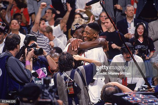 Basketball: NBA finals, Chicago Bulls Michael Jordan victorious, hugging Scottie Pippen after winning game and championship vs Utah Jazz, View of...