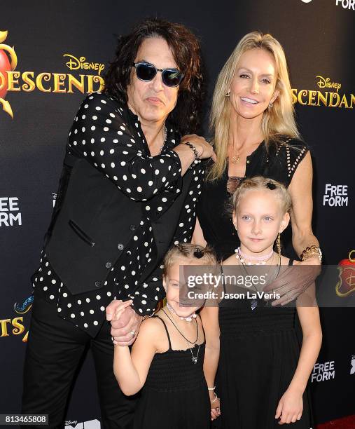 Musician Paul Stanley of the band Kiss, wife Erin Sutton and daughters Emily Grace Stanley and Sarah Brianna Stanley attend the premiere of...