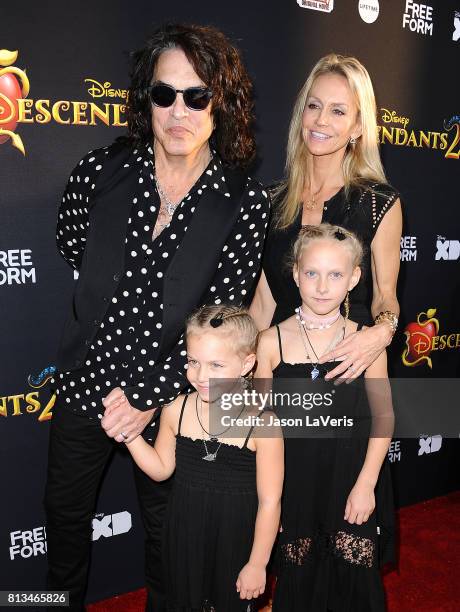 Musician Paul Stanley of the band Kiss, wife Erin Sutton and daughters Emily Grace Stanley and Sarah Brianna Stanley attend the premiere of...