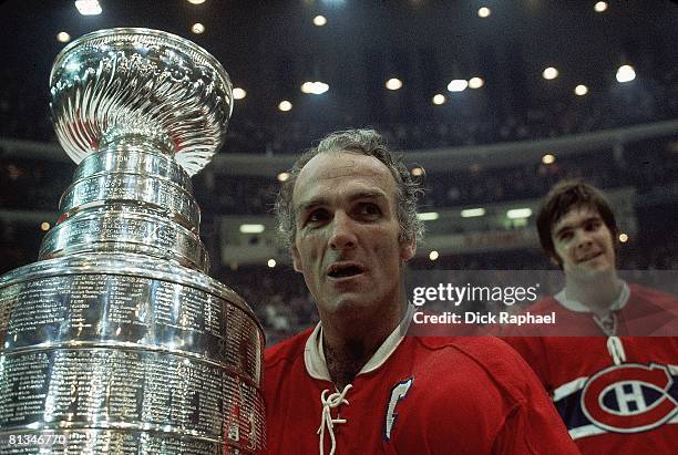 Hockey: NHL Finals, Closeup of Montreal Canadiens Henri Richard victorious with Stanley Cup trophy after winning game and series vs Chicago...