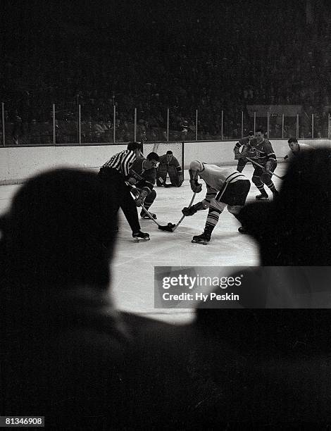 Hockey: Montreal Canadiens goalie Jacques Plante in goal before Maurice Rocket Richard faceoff during game vs Toronto Maple Leafs, Montreal, CAN...