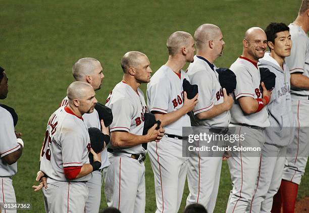 Baseball: AL playoffs, Boston Red Sox Kevin Millar, Trot Nixon, Gabe Kapler, David McCarty, and Todd Jones with shaved heads before game vs New York...