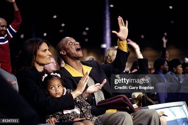 Baseball: Former player Darryl Strawberry with wife Charisse and daughter Jade in church, Tampa, FL 12/7/2003